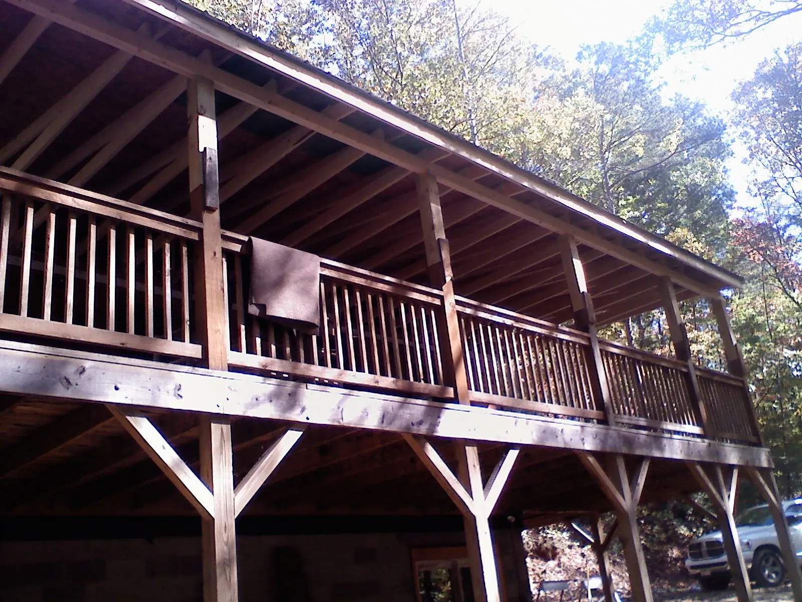 Timber framing under a new elevated porch and deck — Roof Leak Repair in Glenwood by Roofing Brothers